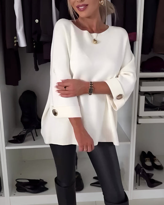 Pull doux à bouton