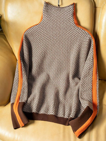 Pull à col montant avec des rayures contrastées saisissantes